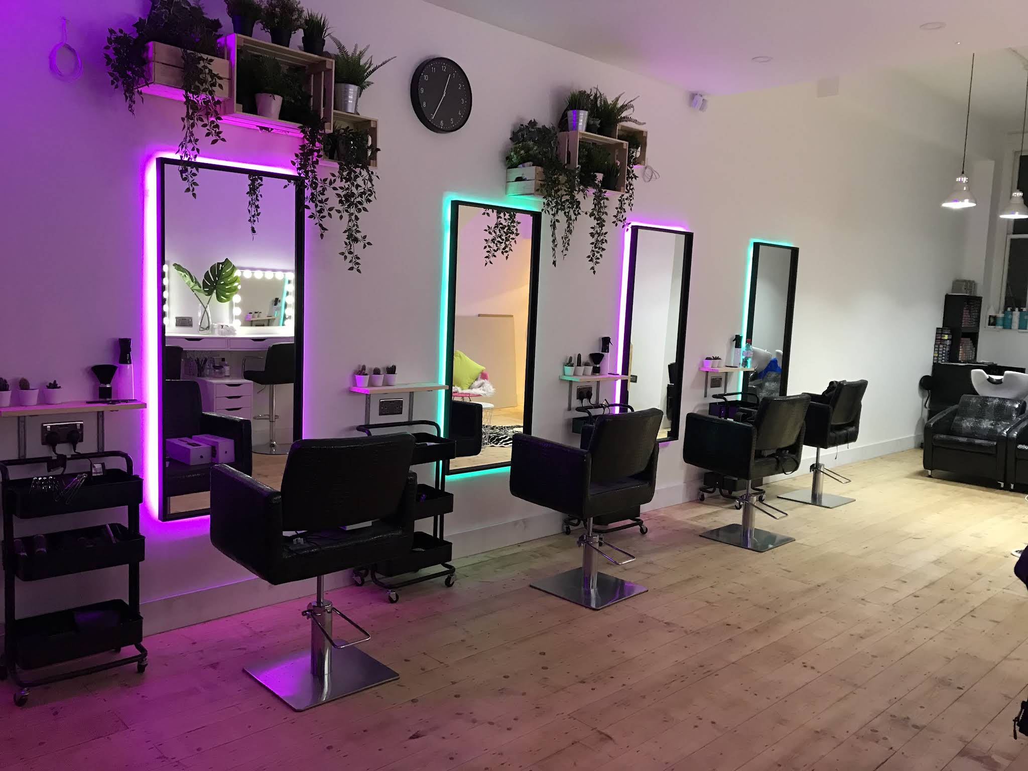 METHOD studio interior with purple-lit mirrors